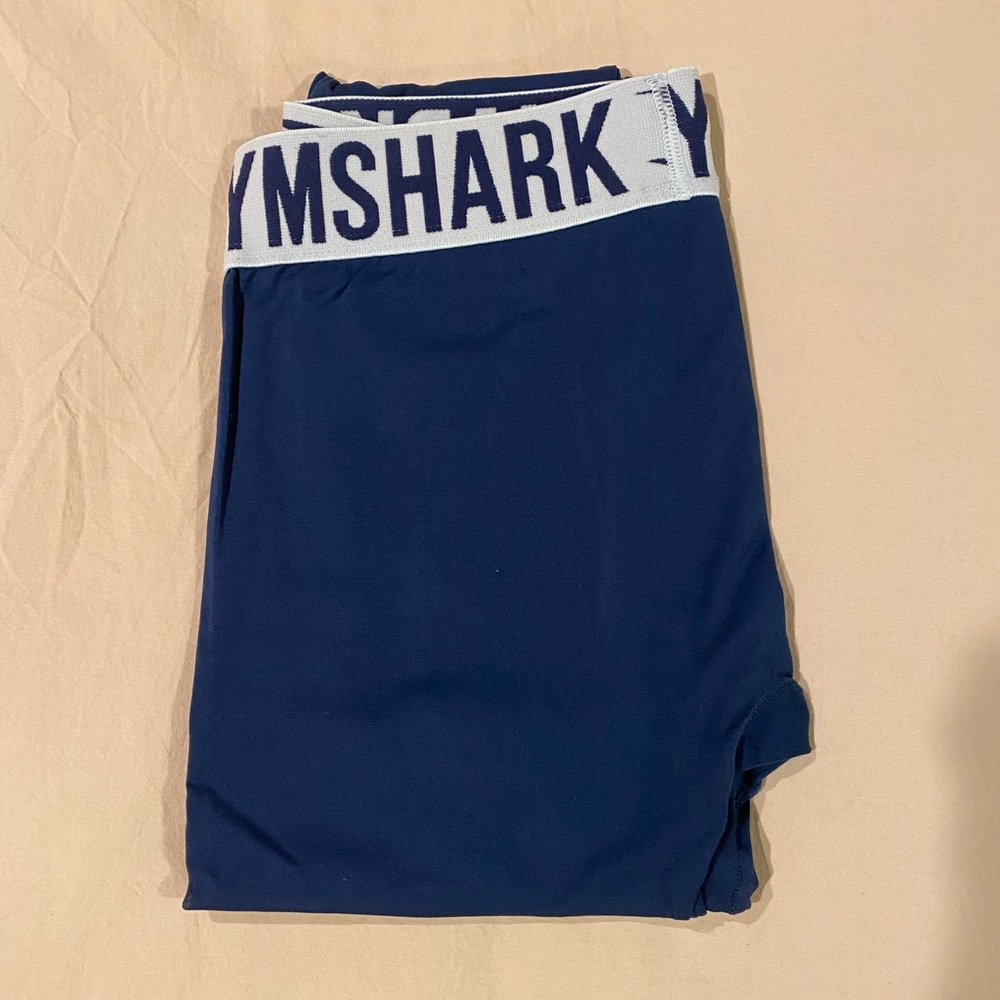 Gymshark Blue Leggings with Light Blue Waistband and Blue Letters Size Small